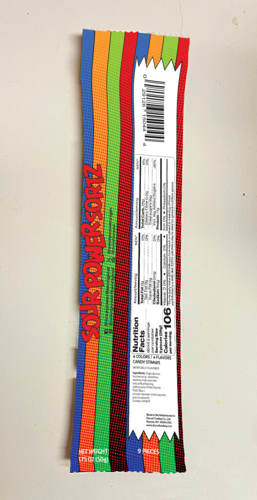Photograph of digital mockup of back packaging for Sour Power Sortz redesign