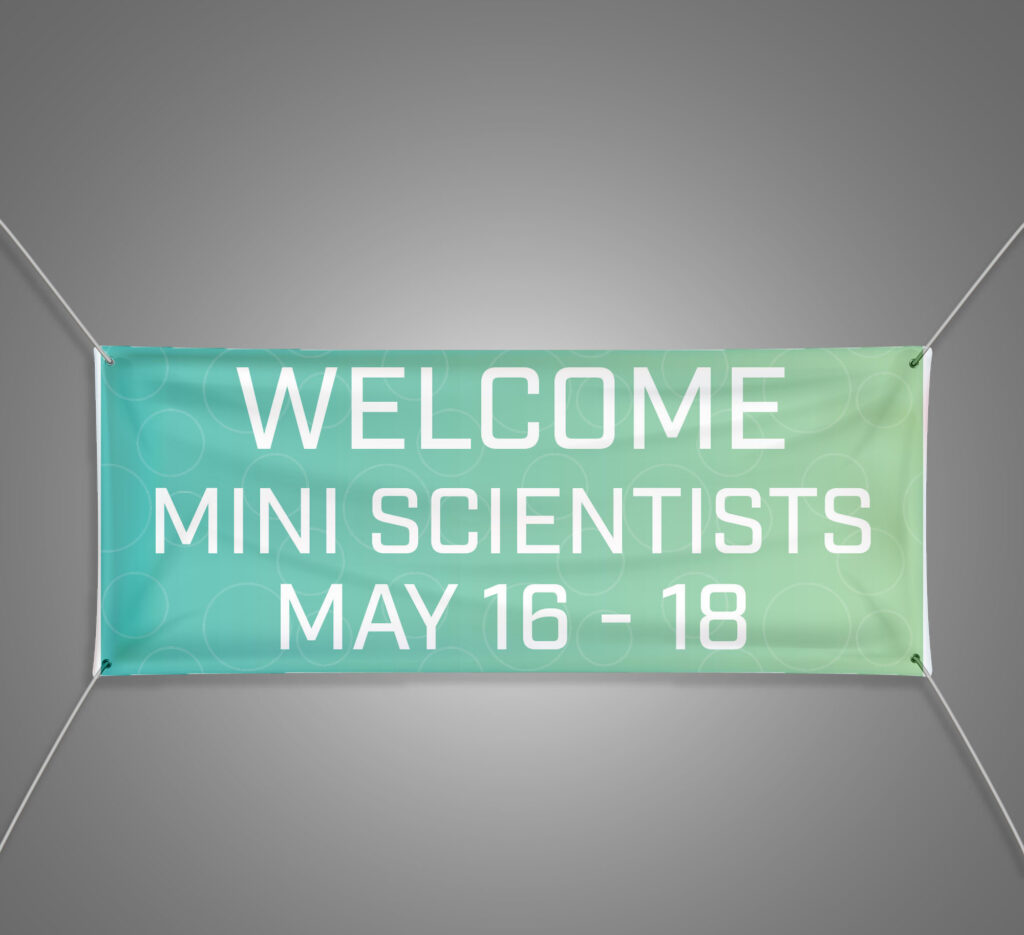 Mockup of Mini Scientists welcome banner against grey wall